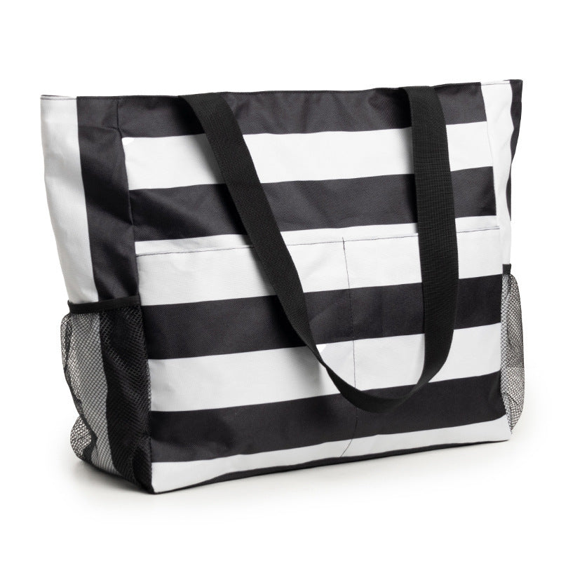 Spacious beach bag with practical outer pockets Bowlift