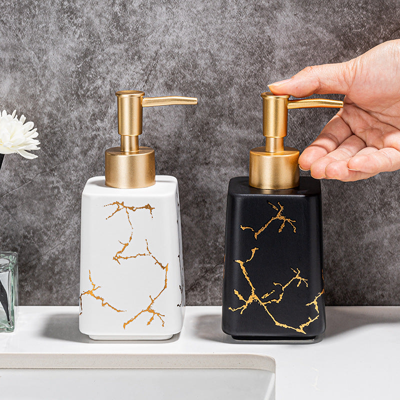 Luxury marble-effect ceramic soap dispenser with gold pump Bowlift