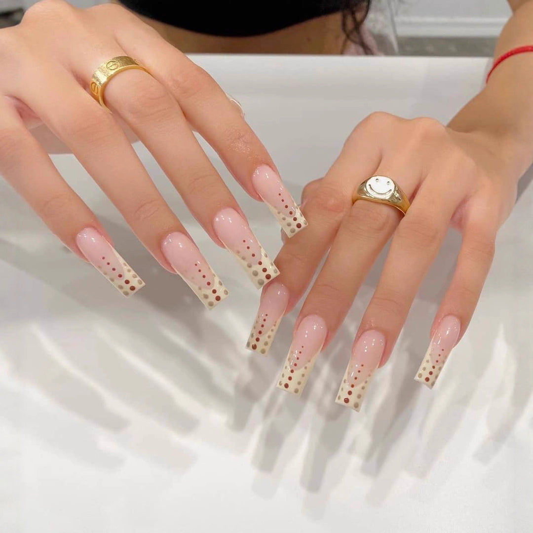 Artistic Nail Extensions with Elegant Dots and Shimmering Ombré Bowlift
