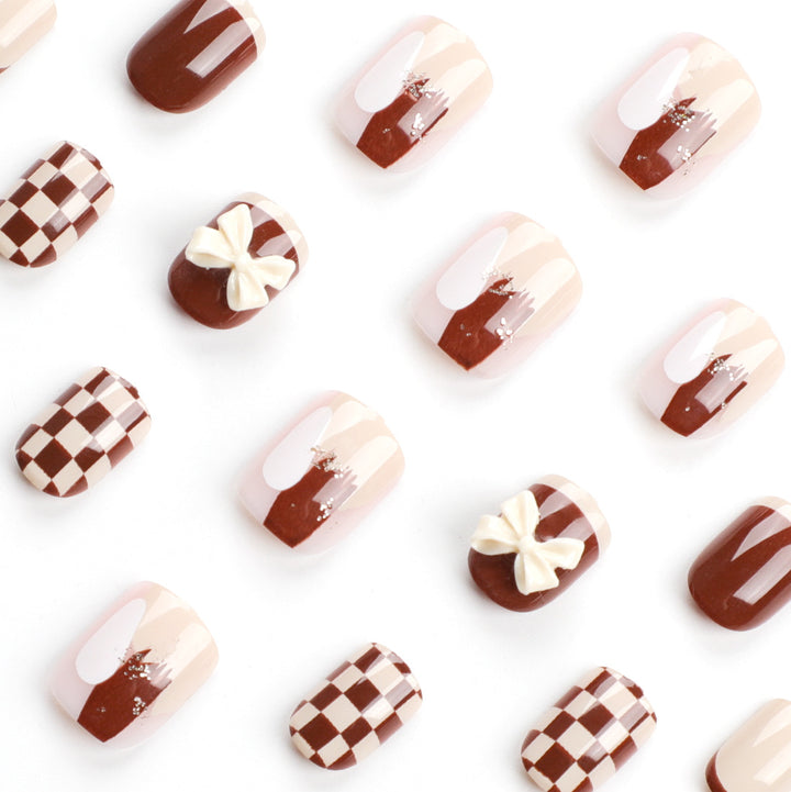 Creative Nail Art with Modern Patterns and Bow Motifs Bowlift