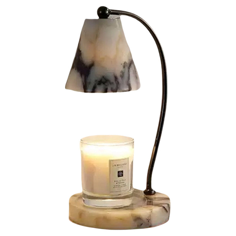 Marble bedside lamp with integrated candle tray and curved metal arm Bowlift