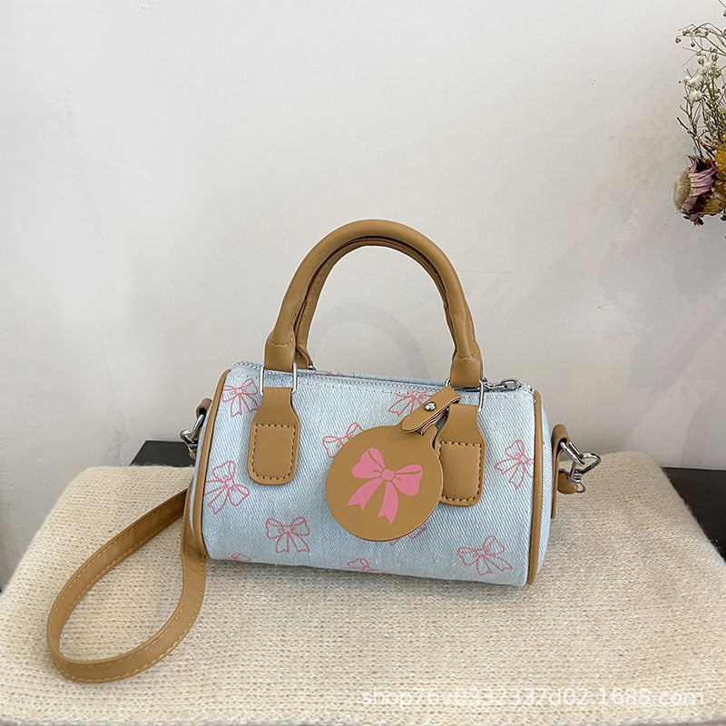 WoPlayful Bow-Printed Mini Handbag Bowlift