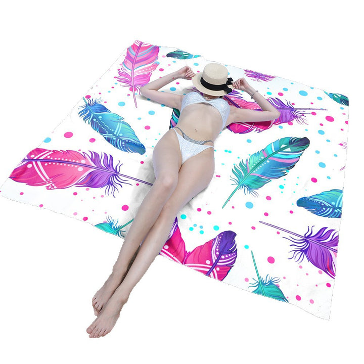 Beach blanket with vibrant floral pattern and innovative structure Bowlift