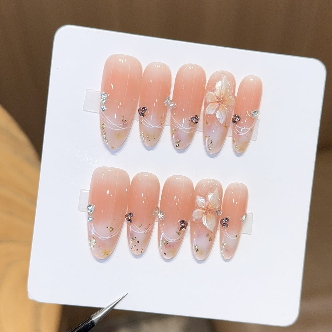 Artificial nails with delicate flower and glitter detail Bowlift