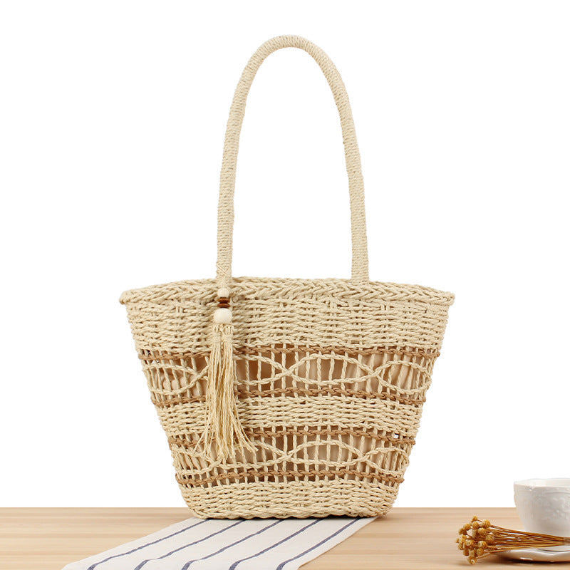 Hand-knotted shopping bag made of natural weave with elegant tassel decoration Bowlift