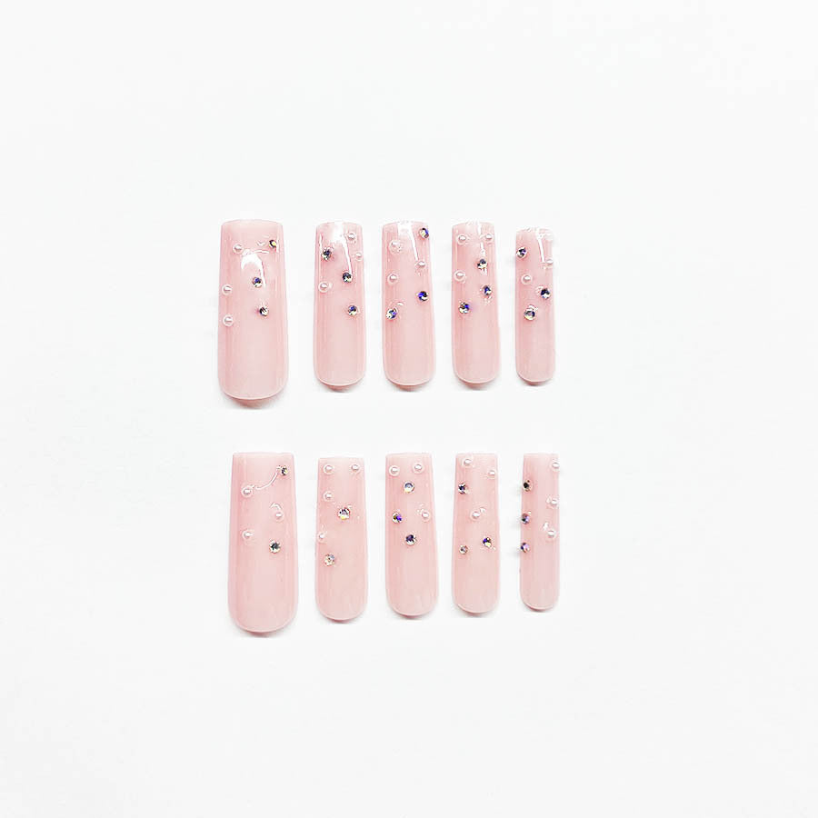 Acrylic nail set with sparkling rhinestone embellishments Bowlift
