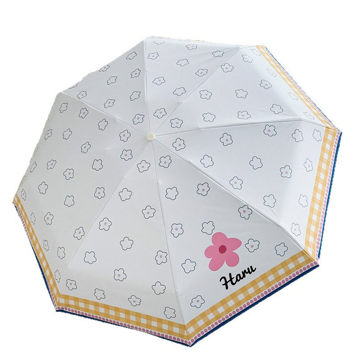 Ladies collapsible umbrella with playful floral pattern Bowlift