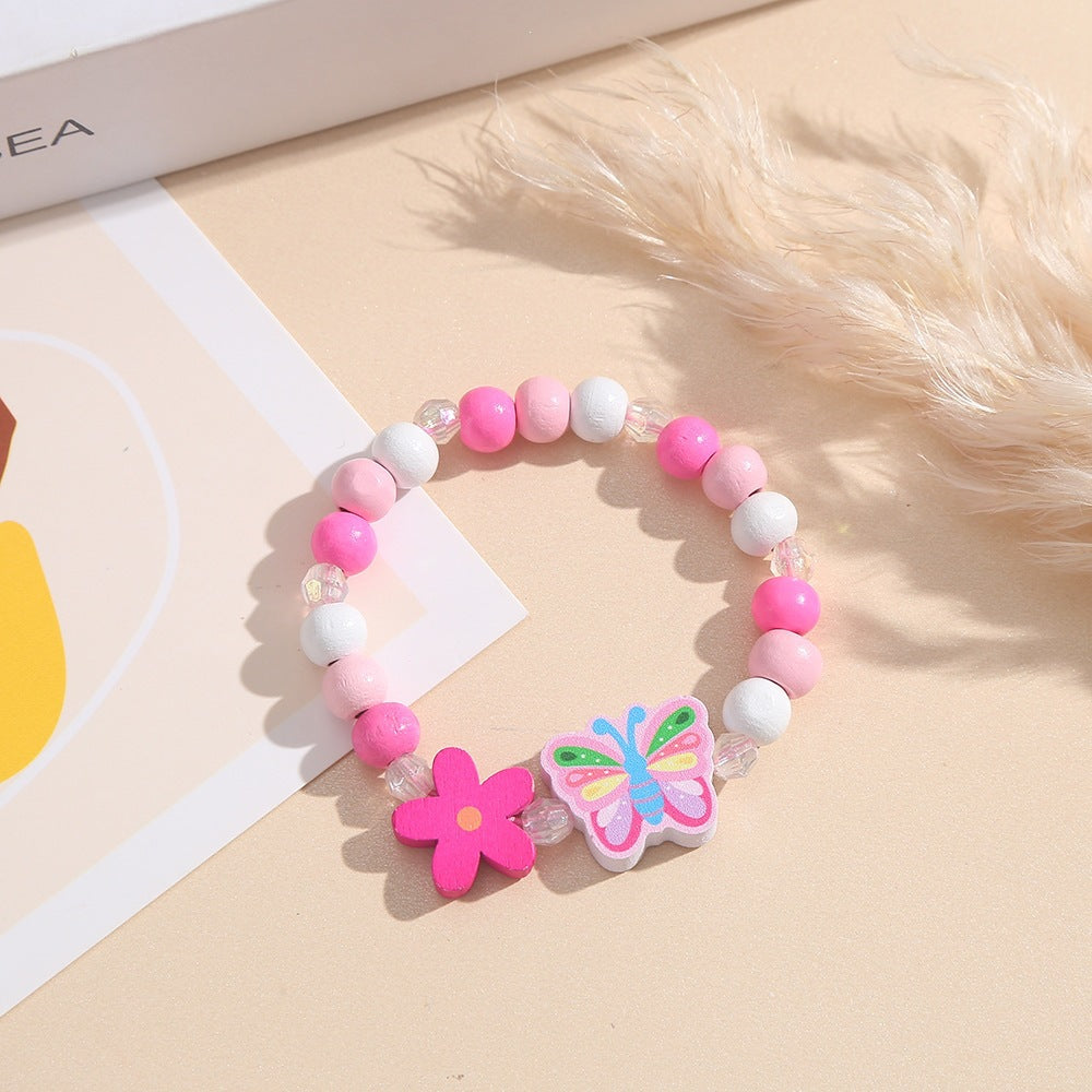 Playful bracelet with heart and butterfly charms Bowlift