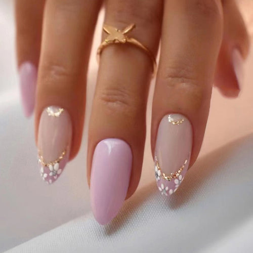 Elegant artificial nails with floral design and golden accents Bowlift