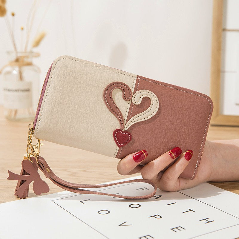 Stylish wallet with heart appliqués Bowlift