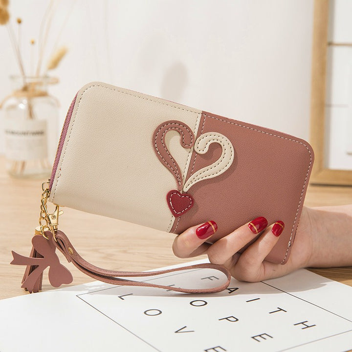 Stylish wallet with heart appliqués Bowlift
