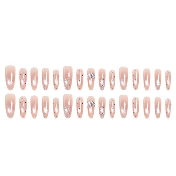 Artificial nail set with sparkling glitter and elegant jewelry details Bowlift