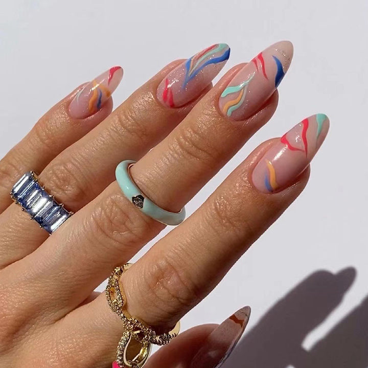 Artful nail extensions with an elegant leaf pattern Bowlift
