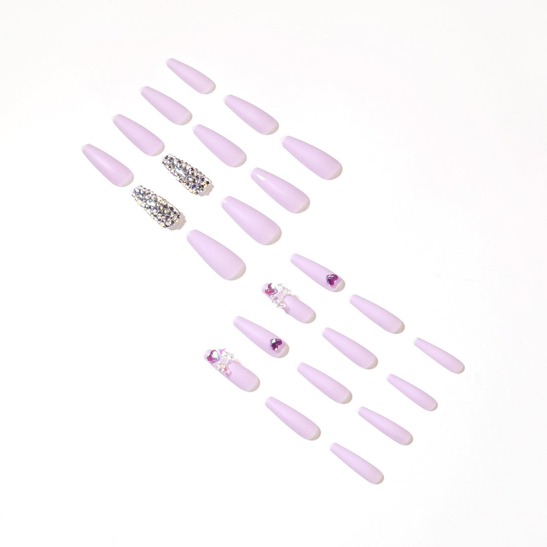 Artistic Stiletto Nails with Glitter and Flower Decorations Bowlift