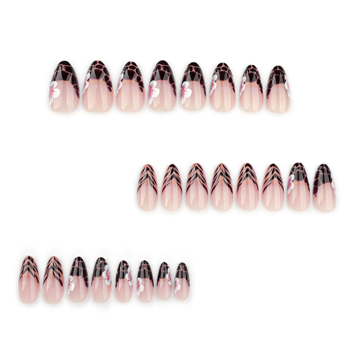 Artful Stiletto nails with floral accent Bowlift