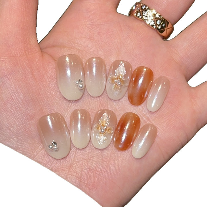 Artificial nails with floral details and glitter coating Bowlift
