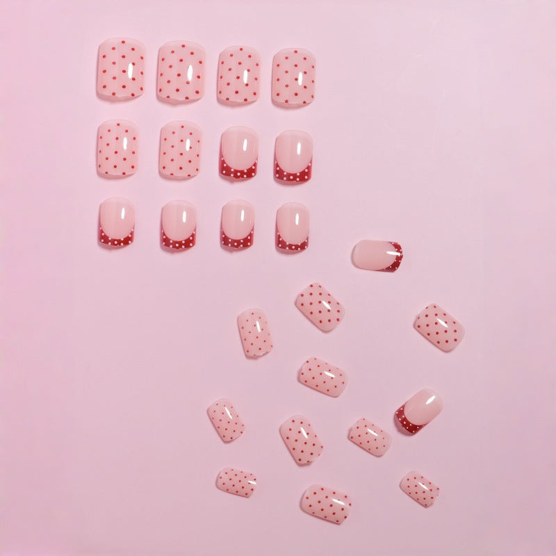 Stylish Press-On Nail Design with Polka Dot and French Tip Accents Bowlift