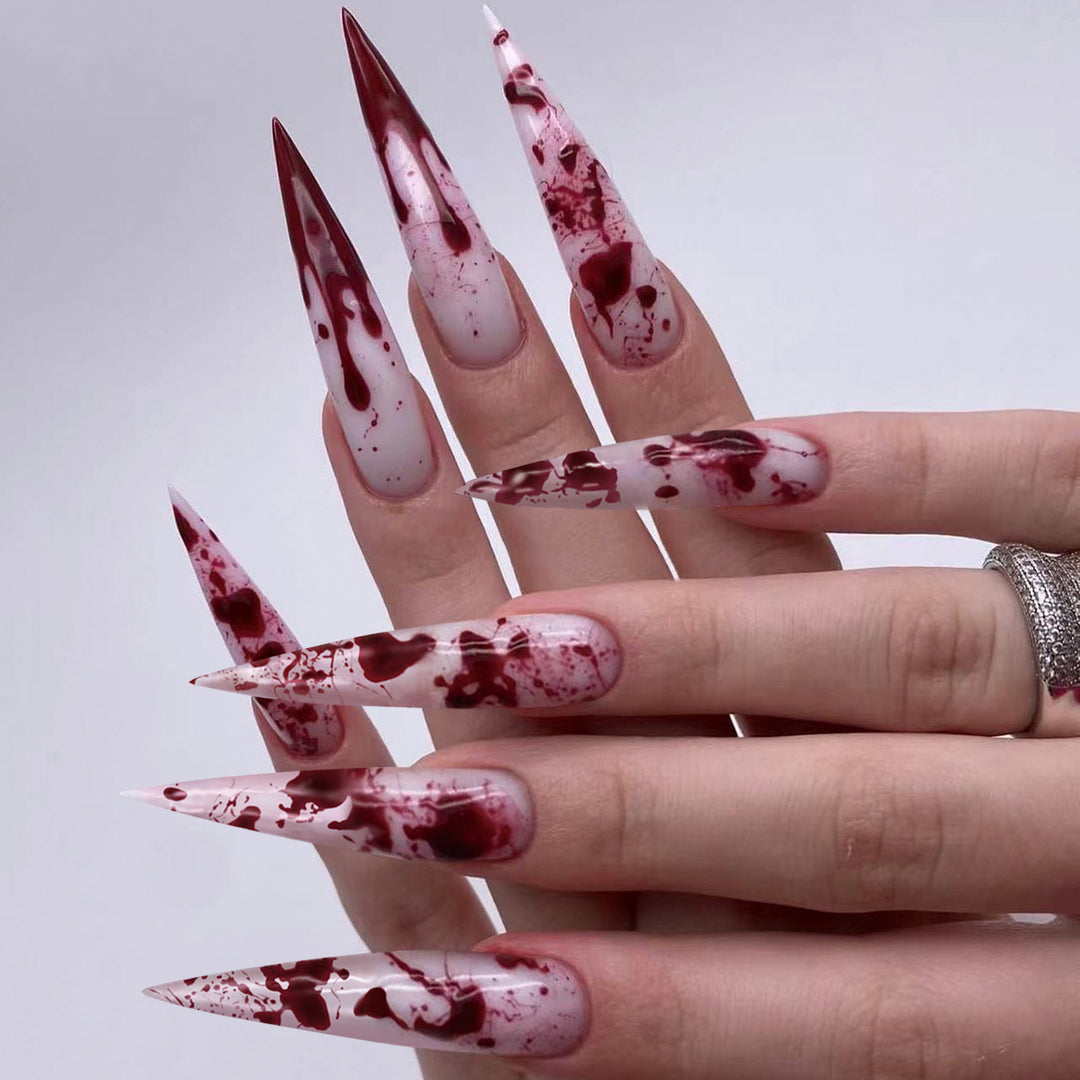 Artificial long stiletto nails with blood design Bowlift