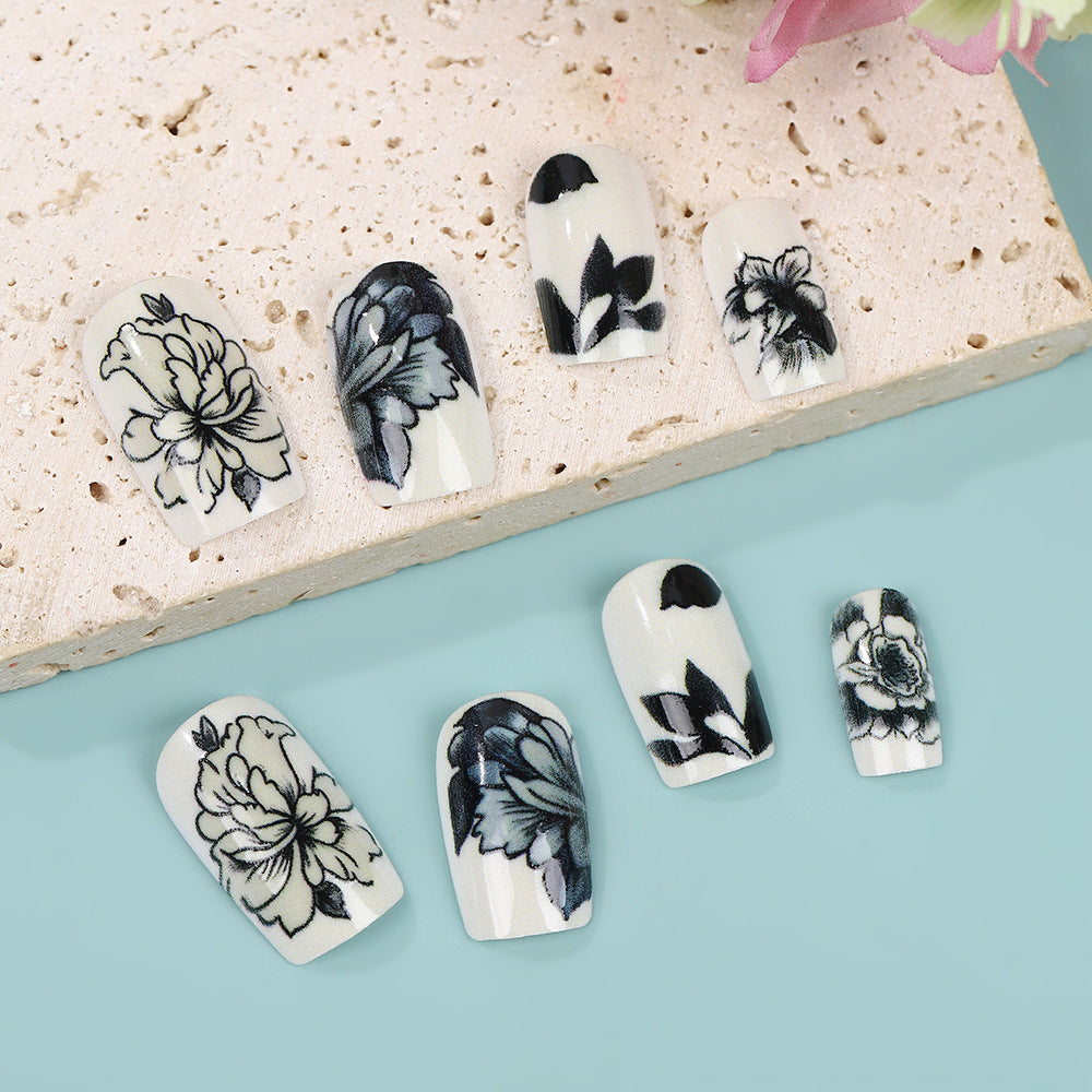 Artificial nails with floral black-and-white design Bowlift