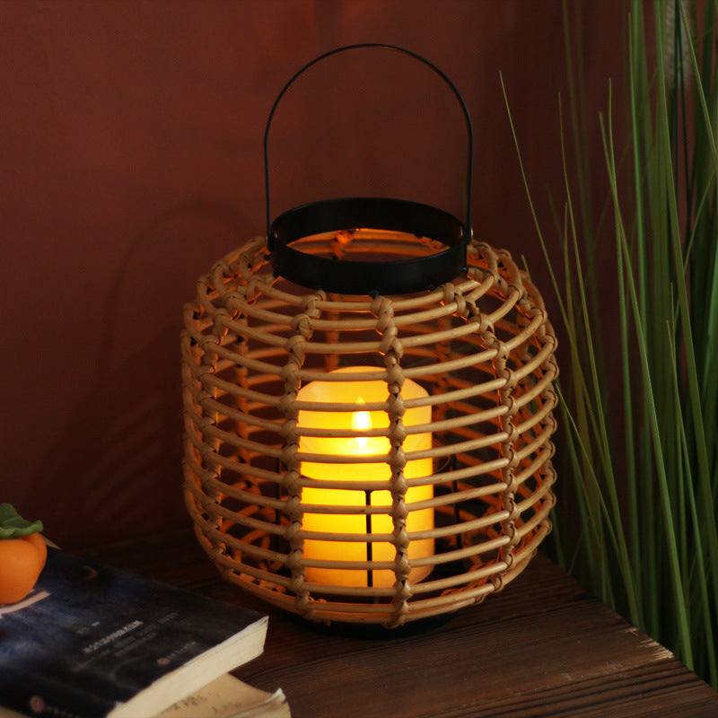 Decorative lantern made of braided rattan Bowlift