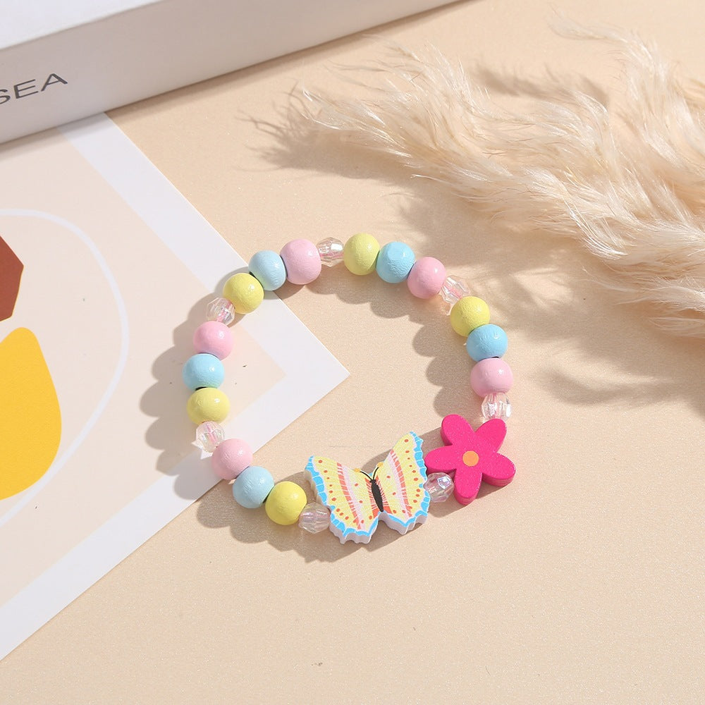 Playful bracelet with heart and butterfly charms Bowlift
