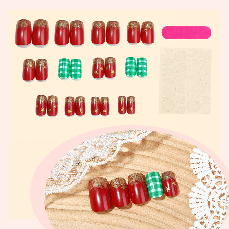 Artificial nail set with festive Christmas design and glamorous accents Bowlift