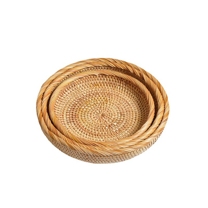 Round serving platter made of braided rattan Bowlift