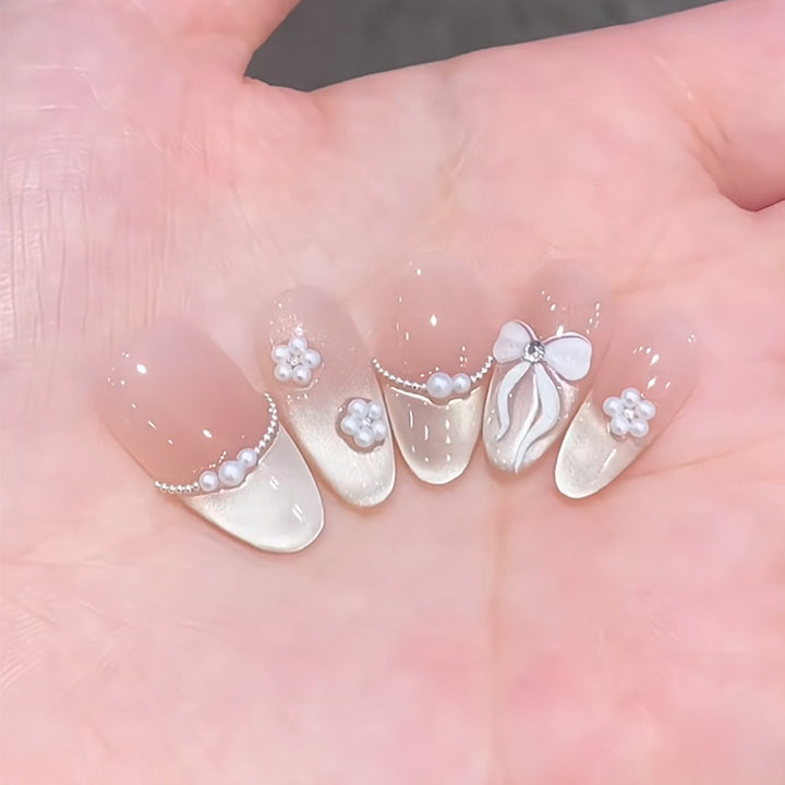 Artistic Nail Extensions with Decorative Elements Bowlift