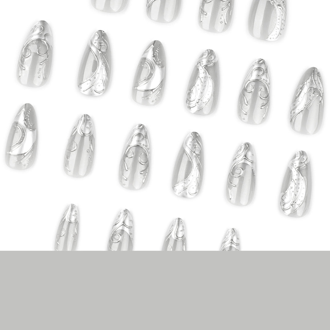 Artistic stiletto nails with elegant silver design Bowlift