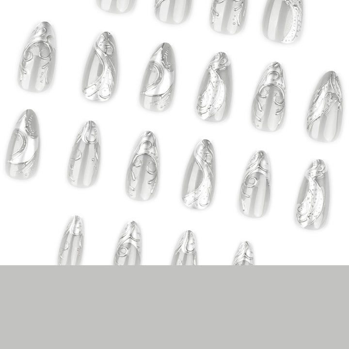 Artistic stiletto nails with elegant silver design Bowlift