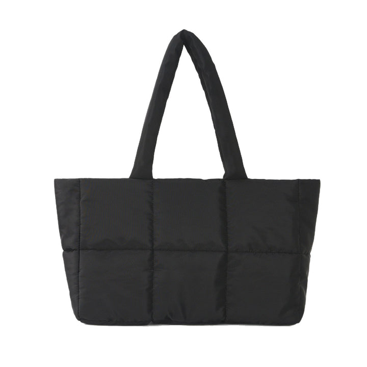Padded carrying bag with modern quilted design Bowlift
