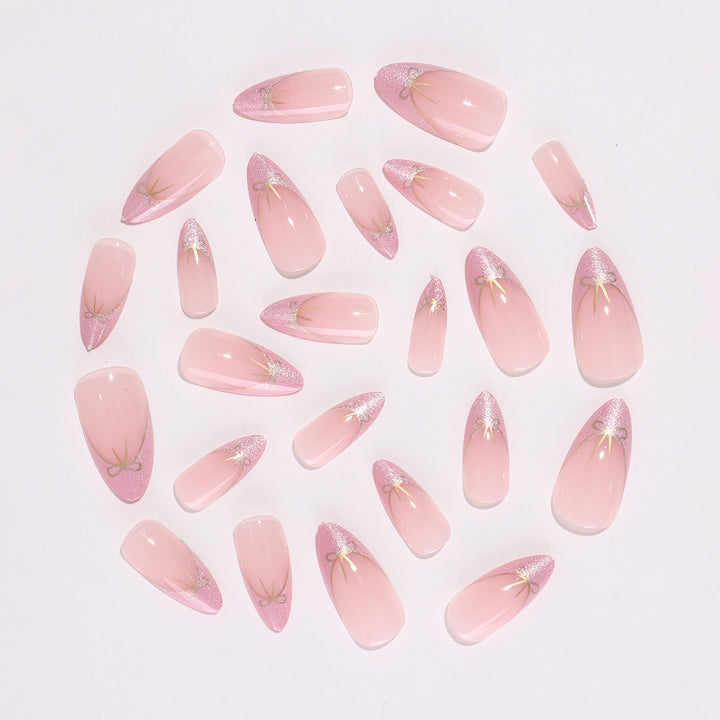 Artificial nail set with shimmering tips and elegant bows Bowlift