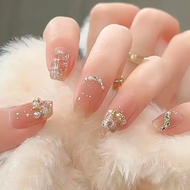 Artificial nail set with shiny 3D accents Bowlift