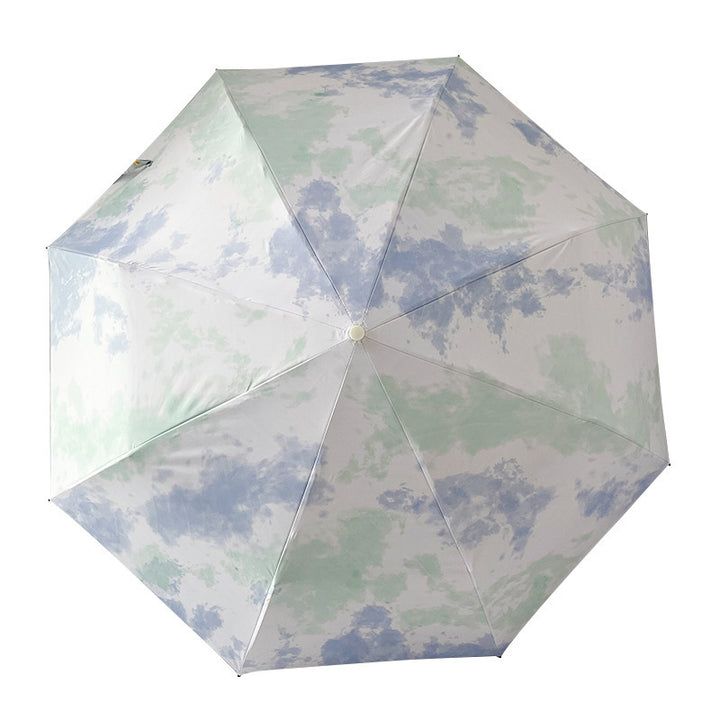 Ladies elegant folding umbrella with modern cloud pattern Bowlift