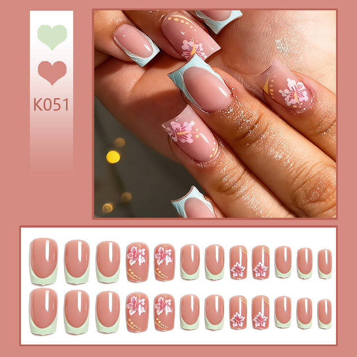 Artificial nails with floral design and glitter details Bowlift