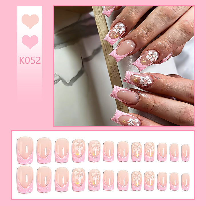 Artificial nail set with floral applications and elegant accents Bowlift