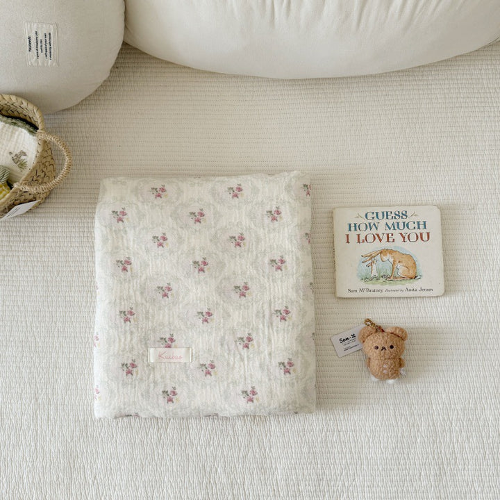 Unisex Muslin Blanket with delicate floral design and elegant ruffles Bowlift