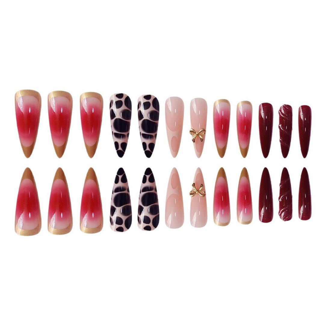 Artistic Stiletto Press-On Nail Set with Unique Accents Bowlift