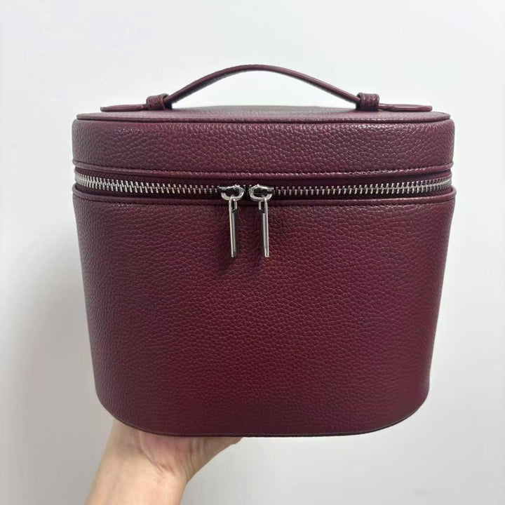 Cosmetic bag with practical carrying handle and double zipper Bowlift