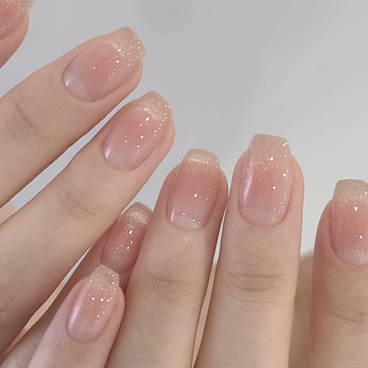 Elegant Nail Designs with Glitter and Gradient Bowlift