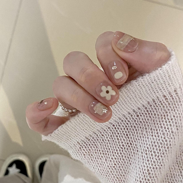 Artificial nails with elegant floral designs Bowlift
