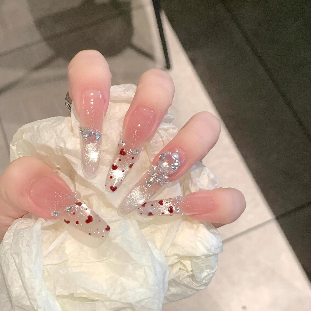 Nail art set with sparkling rhinestones and heart design Bowlift