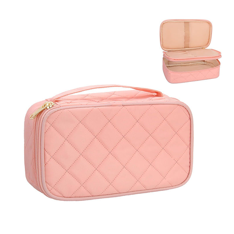 Cosmetic storage bag with elegant quilted pattern Bowlift