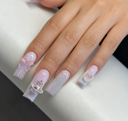 Artificial nails with delicate embellishments Bowlift