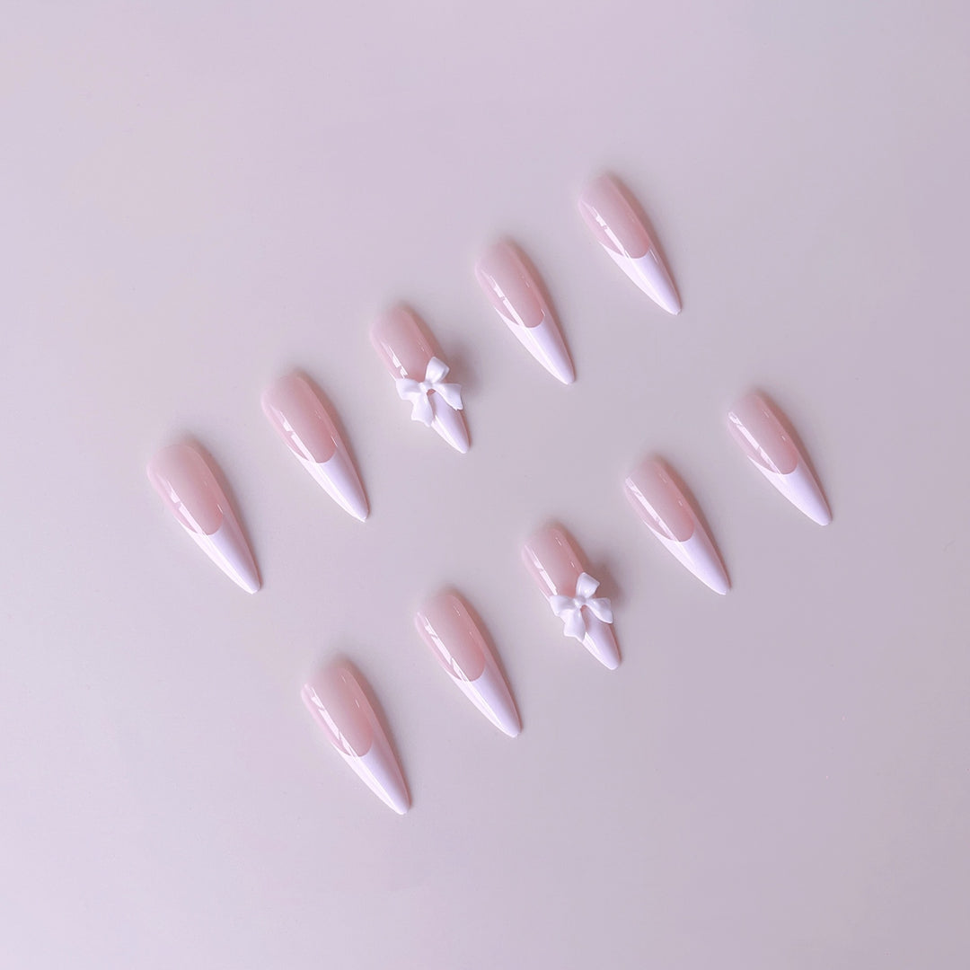 Acrylic nail set with elegant tips and 3D decorations Bowlift
