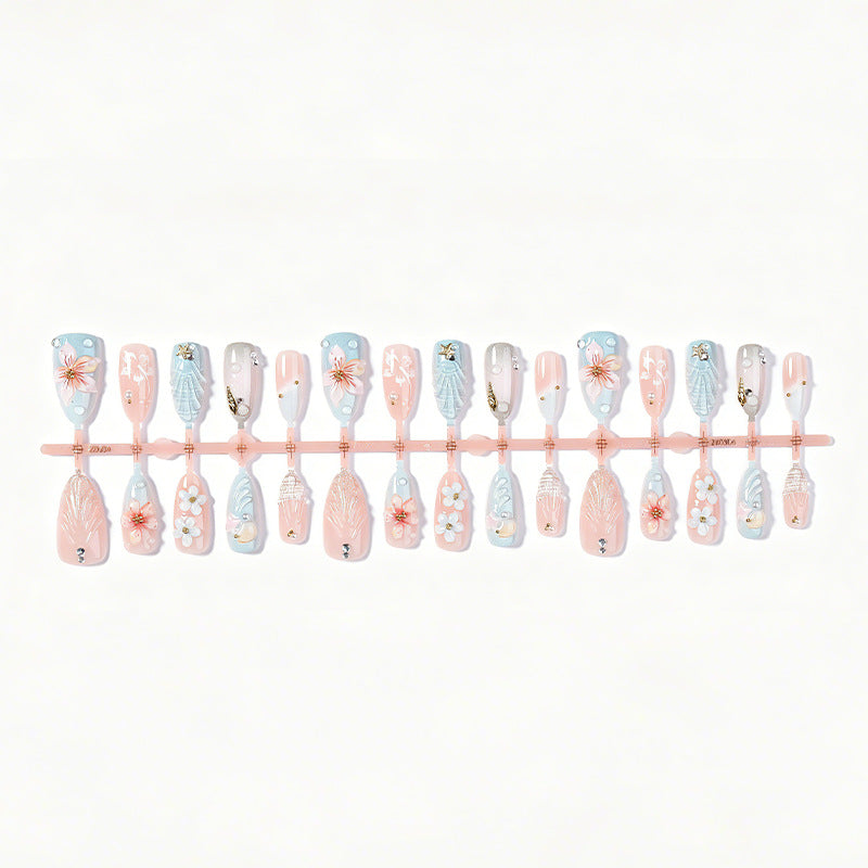 Artificial nail set with maritime motifs and colorful flowers Bowlift