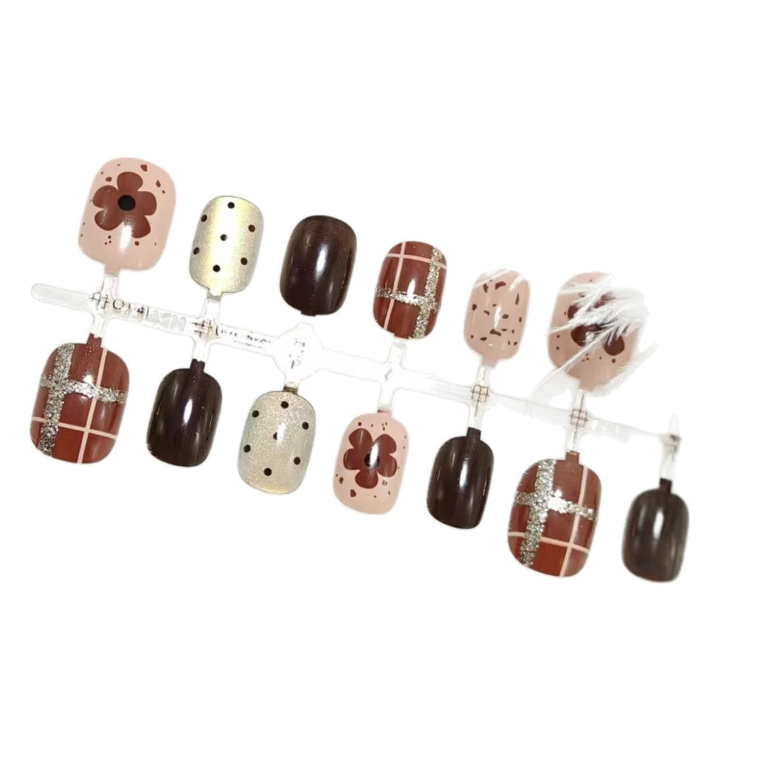 Artificial nails with floral and glittering design Bowlift