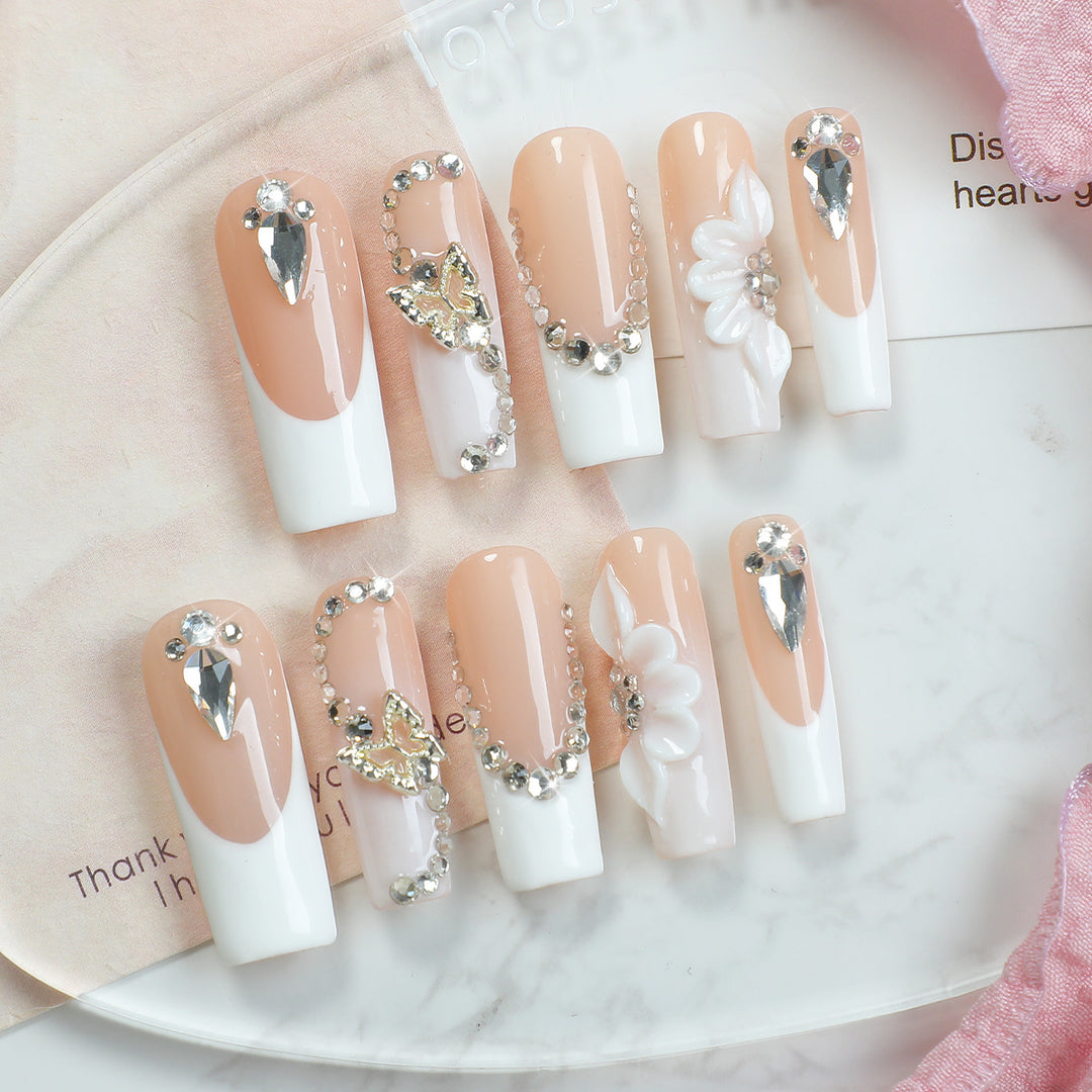 Artificial nail set with elegant glitter and flower motifs Bowlift