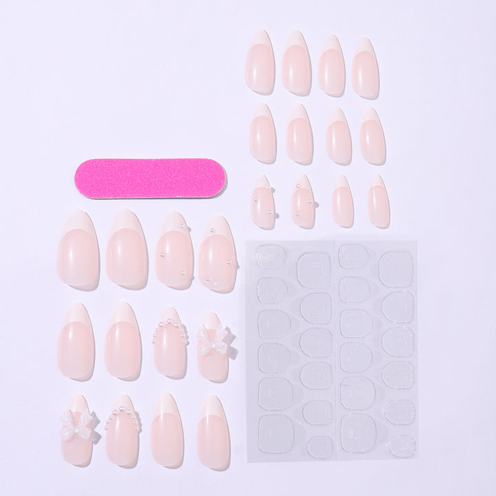 Artificial nail set with luxurious embellishments and sparkling details Bowlift