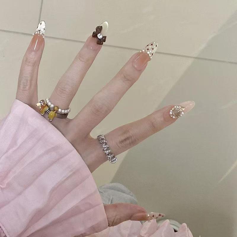 Artistic Stiletto Press-On Nail Set with Floral Embellishments Bowlift